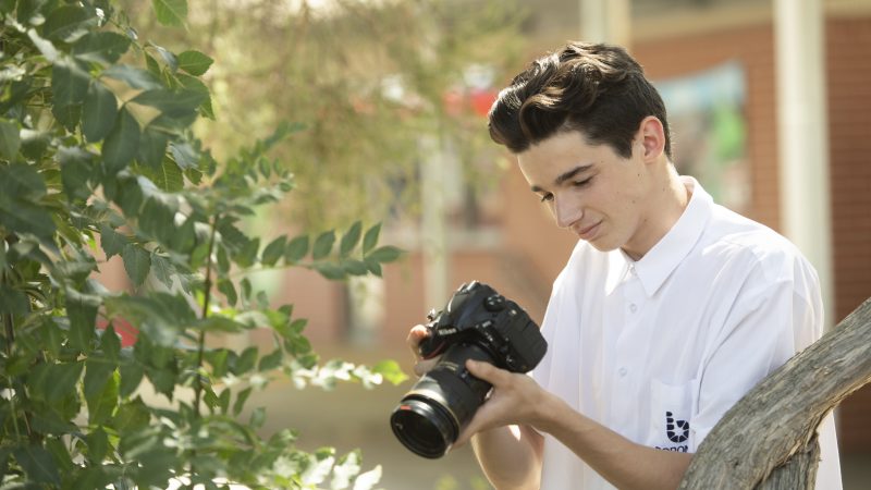 Student with camera